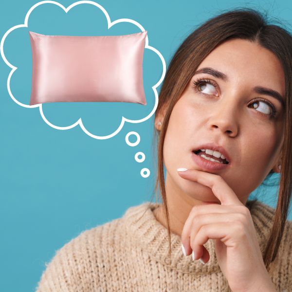 Woman weighing the disadvantages of silk pillowcases before buying — considering skin and hair benefits